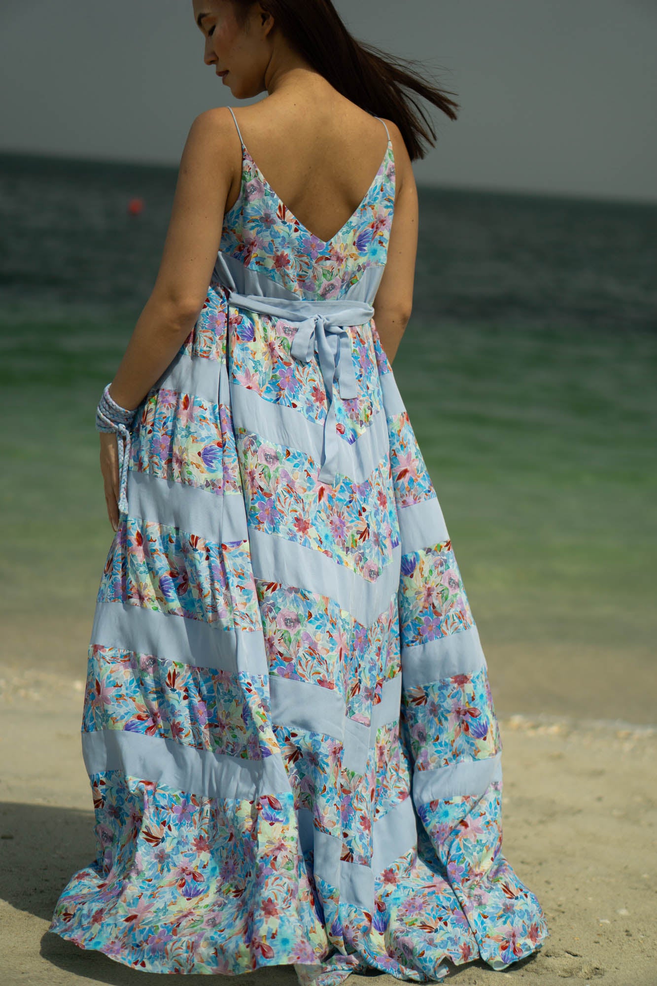 The lower half of the dress is flowy and umbrella like making it comfortable and breezy and can be worn as a cover-up for bikini, perfect for the hot weather.