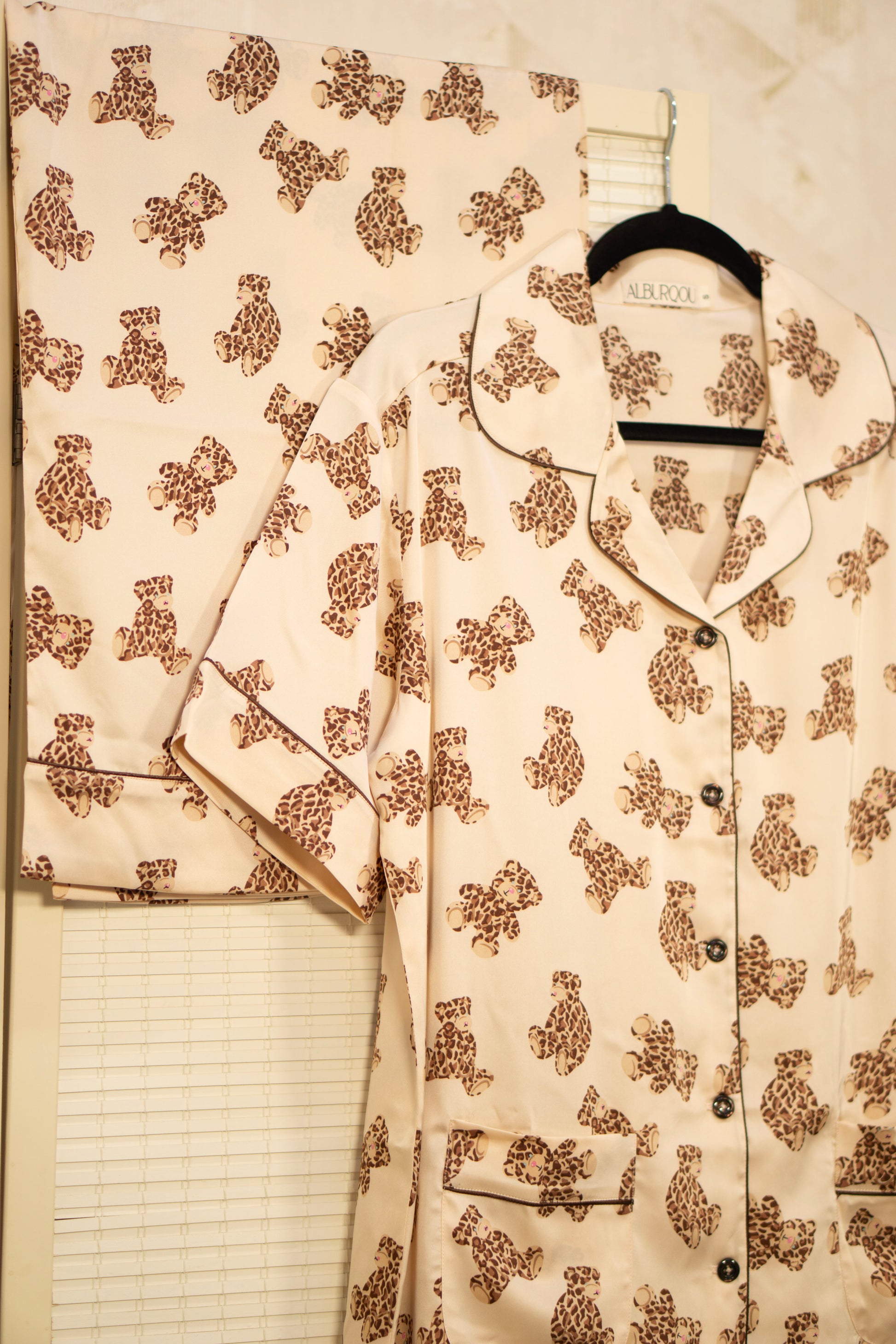 Premium Satin Beige PJs with Leopard printed Teddy Bears consists of pajama shirt with collar, short-sleeves and button-down top, the PJ pants are wide-leg with elastic band