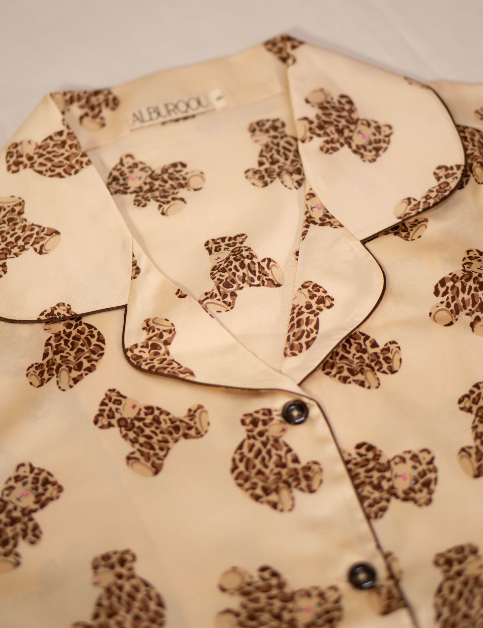ALBURQOU's Premium Satin Beige PJs with Leopard printed Teddy Bears consists of pajama shirt with collar, short-sleeves and button-down top.