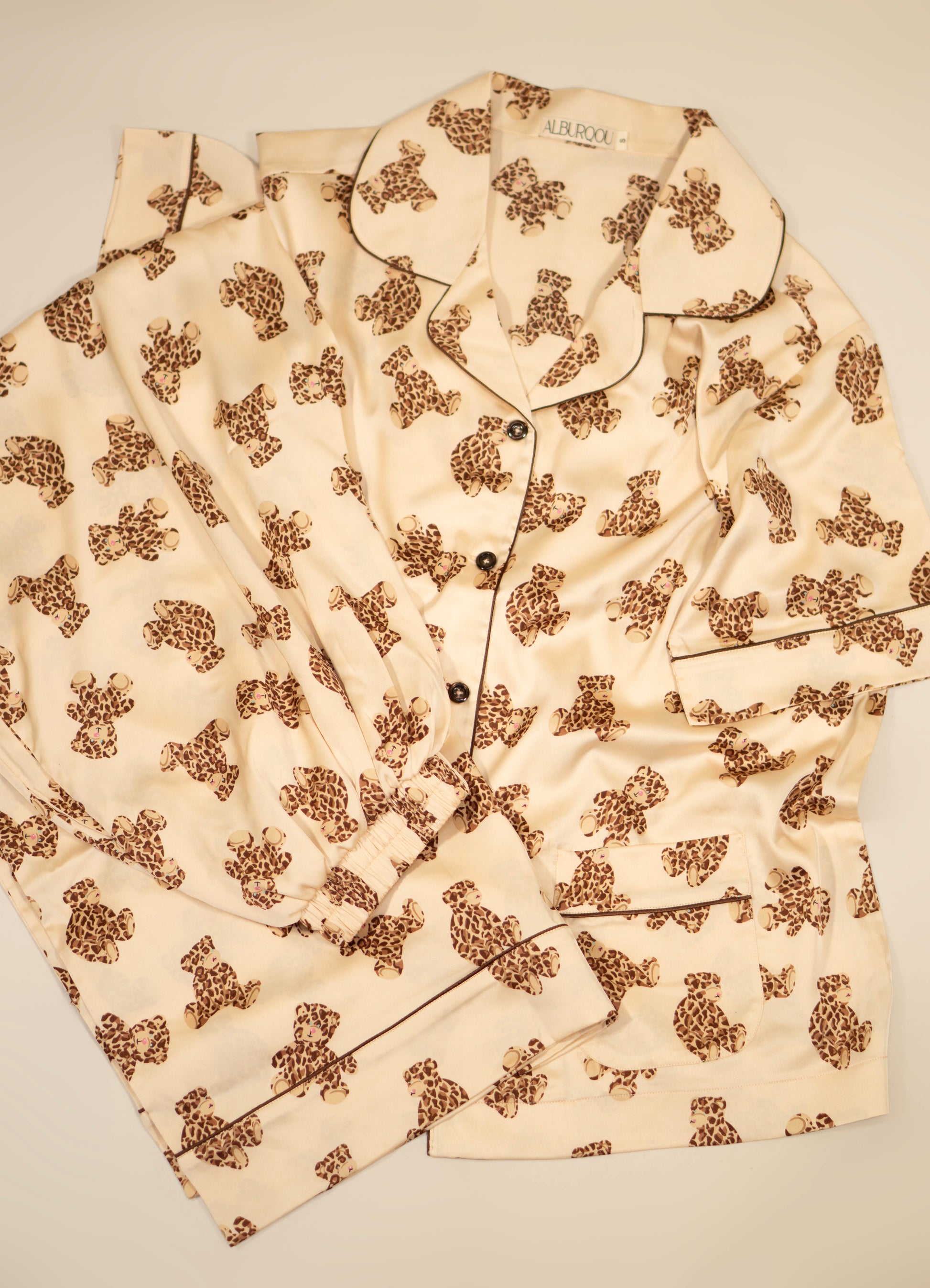 Premium Satin Beige PJs with Leopard printed Teddy Bears consists of pajama shirt with collar, short-sleeves and button-down top, the PJ pants are wide-leg with elastic band