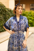 Blue bohemian printed maxi shirt dress for women with button-down front and modest silhouette, the dress shirt has a solid colour collar and sleeve cuffs. The dress also consist of pockets!