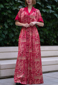 Red bohemian printed maxi shirt dress for women with button-down front and modest silhouette, the dress shirt has a solid colour collar and sleeve cuffs. The dress also consist of pockets!