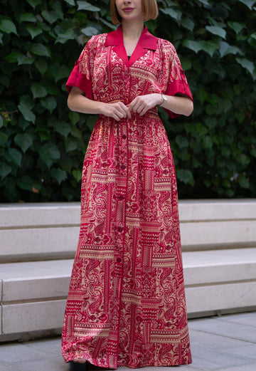 Red bohemian printed maxi shirt dress for women with button-down front and modest silhouette, the dress shirt has a solid colour collar and sleeve cuffs. The dress also consist of pockets!
