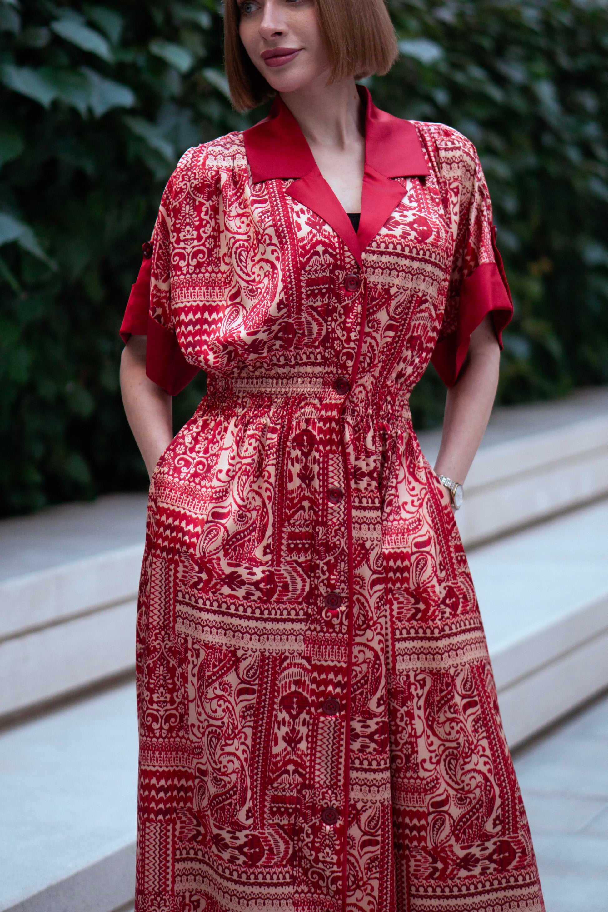 Red bohemian printed maxi shirt dress for women with button-down front and modest silhouette, the dress shirt has a solid colour collar and sleeve cuffs. The dress also consist of pockets!