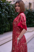 Red bohemian printed maxi shirt dress for women with button-down front and modest silhouette, the dress shirt has a solid colour collar and sleeve cuffs. The dress also consist of pockets!